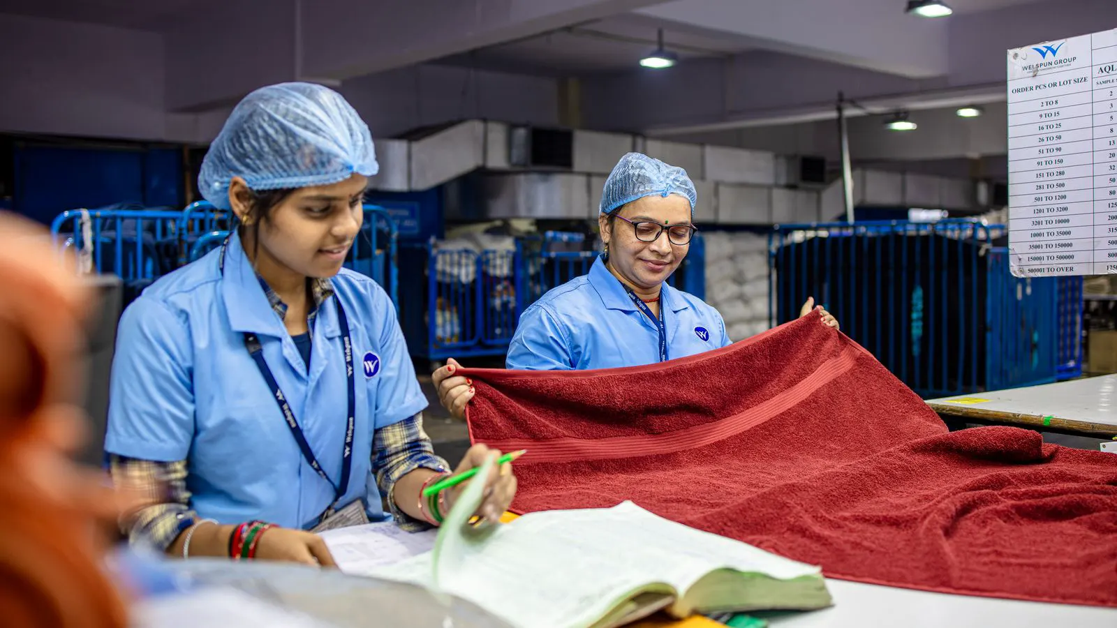 Close view of a medical nonwoven fabric roll on a production line