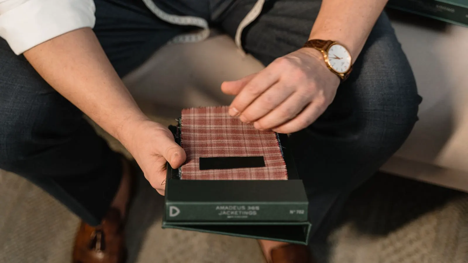 Close up of fabric swatches and testing equipment in a laboratory