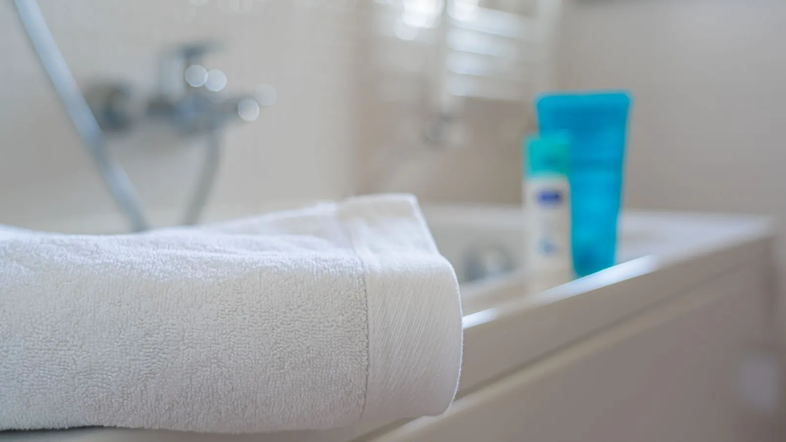 Stack of folded bath towels showing texture and depth