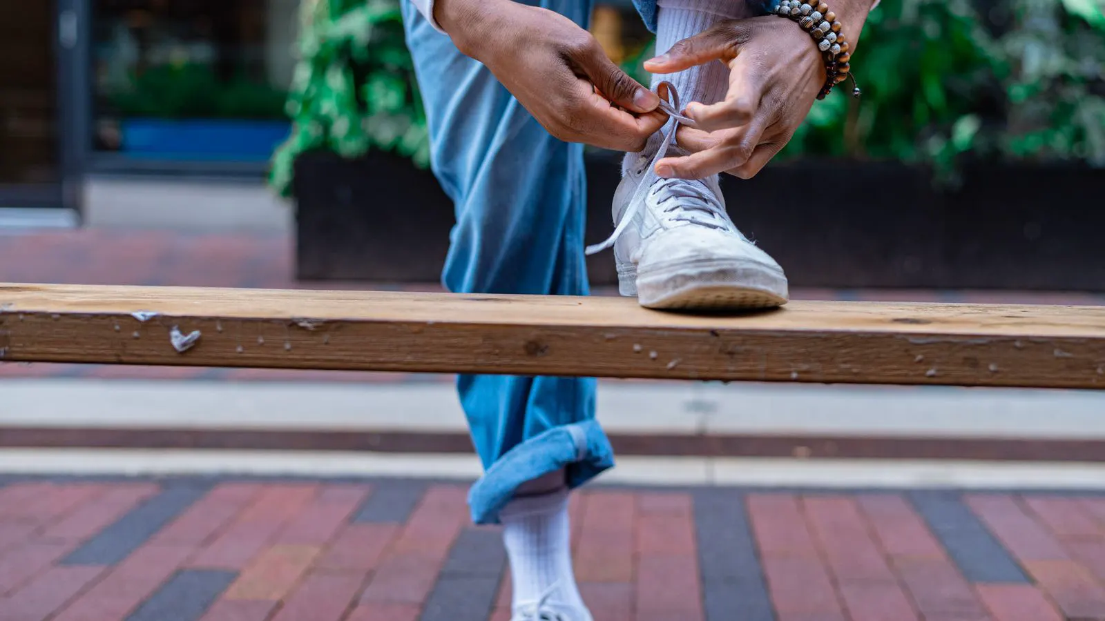 A pair of athletic shoe lasts on a QC bench with calipers