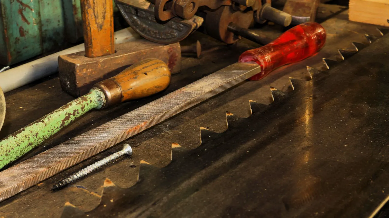 A wooden shoe last sitting on a workshop bench