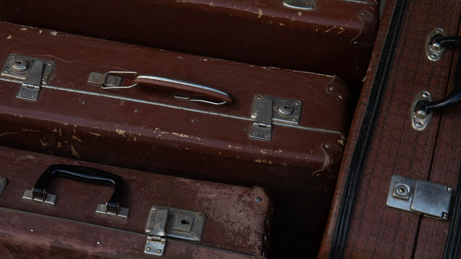 Close view of metal and polymer luggage hardware parts