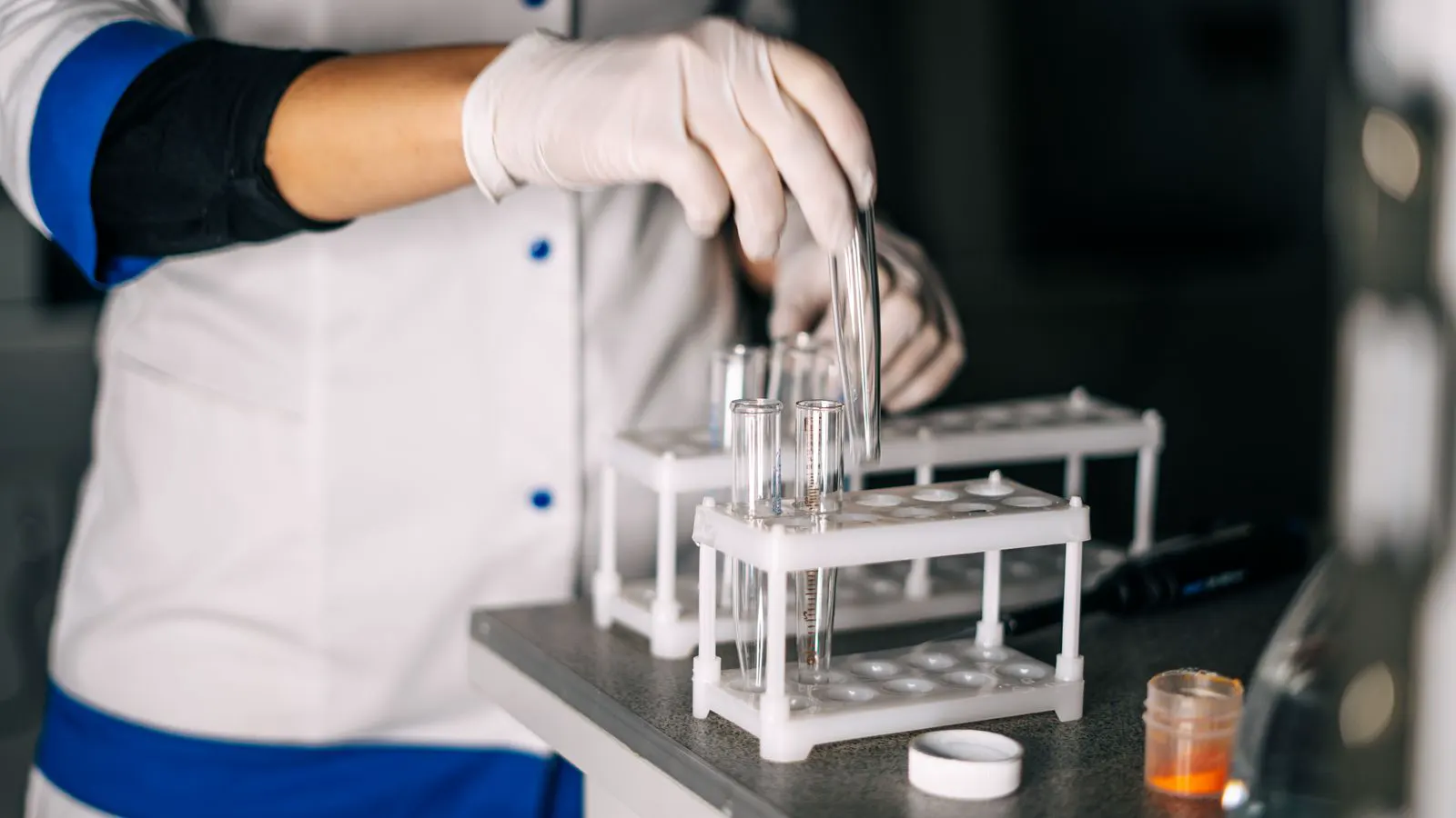 A professional laboratory setting with testing equipment on a bench.