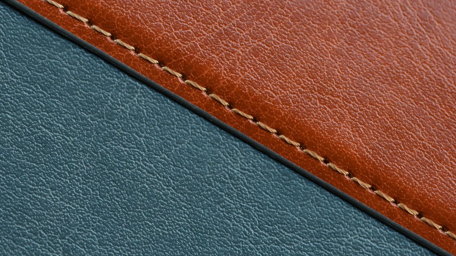 A close view of a stitched bag corner showing thread tension