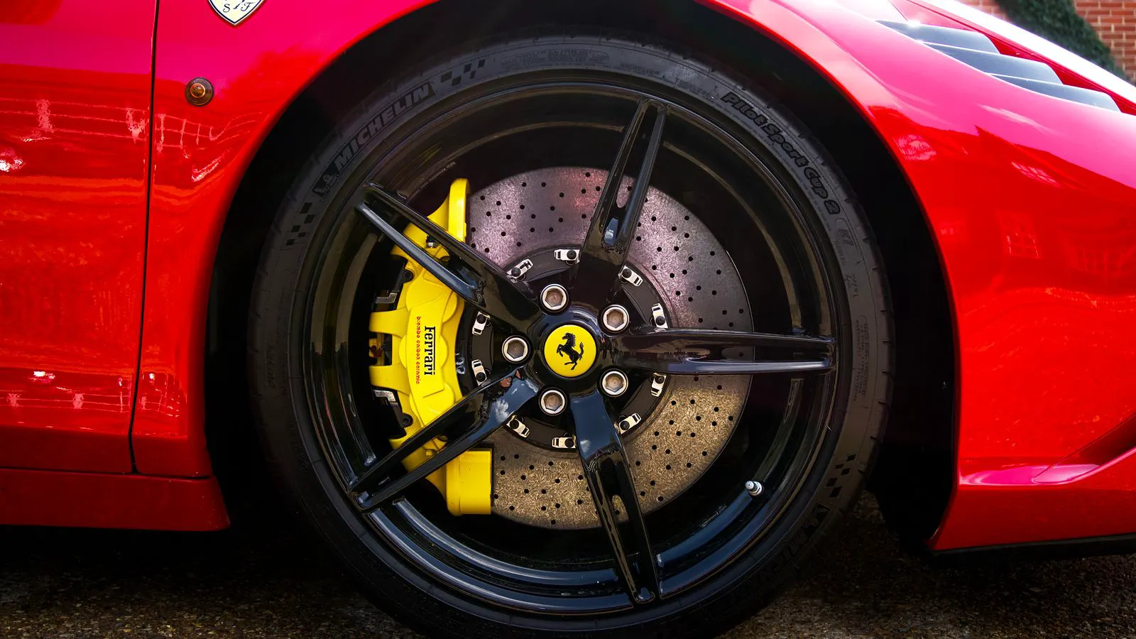 Close view of a steel rim showing uneven tread wear