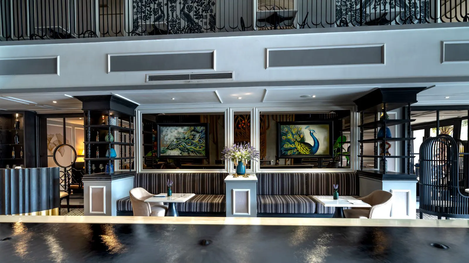 Seating area showing durable contract upholstery next to a dining table setup