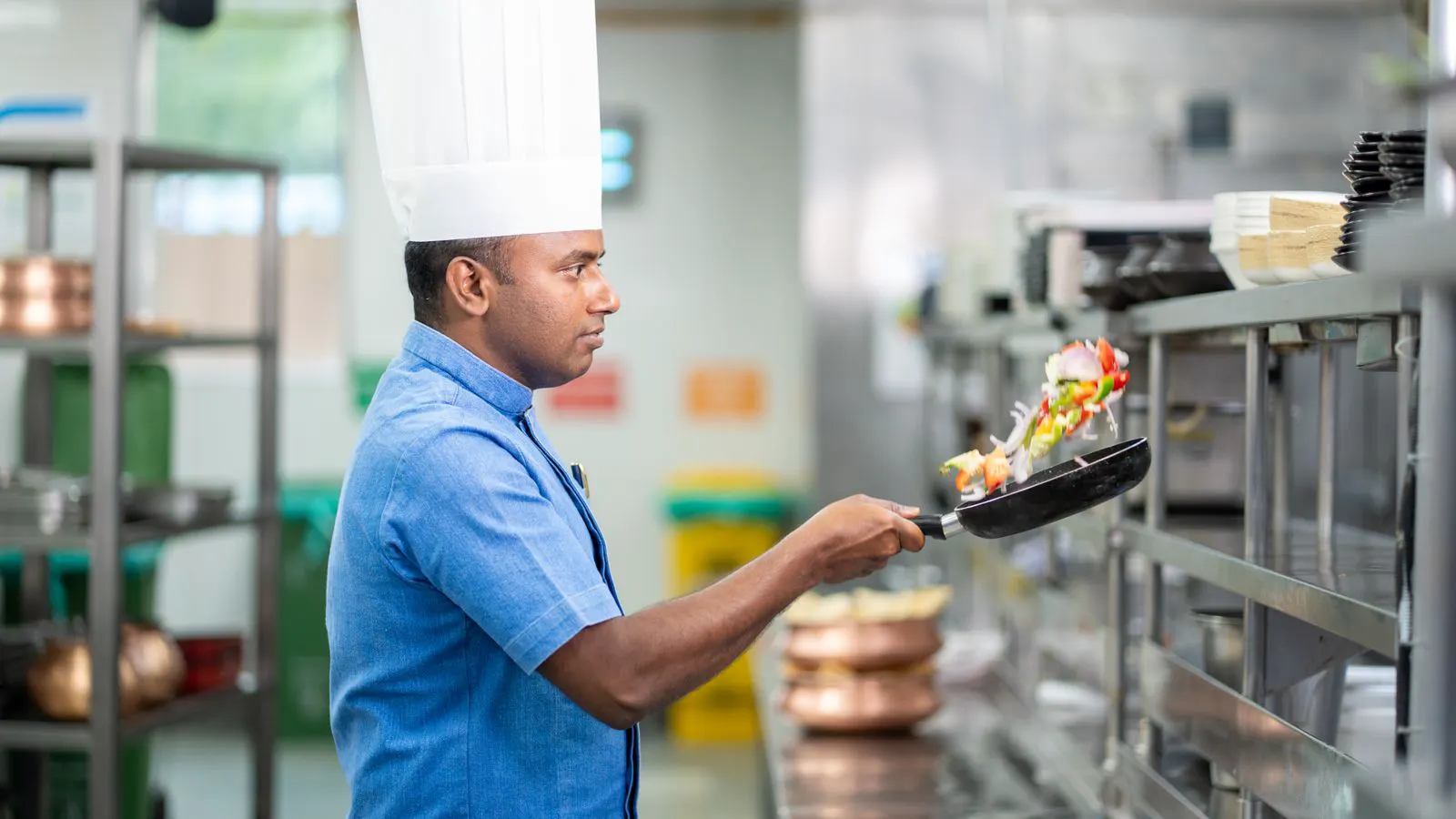 A spreadsheet showing kitchen equipment costs on a desk