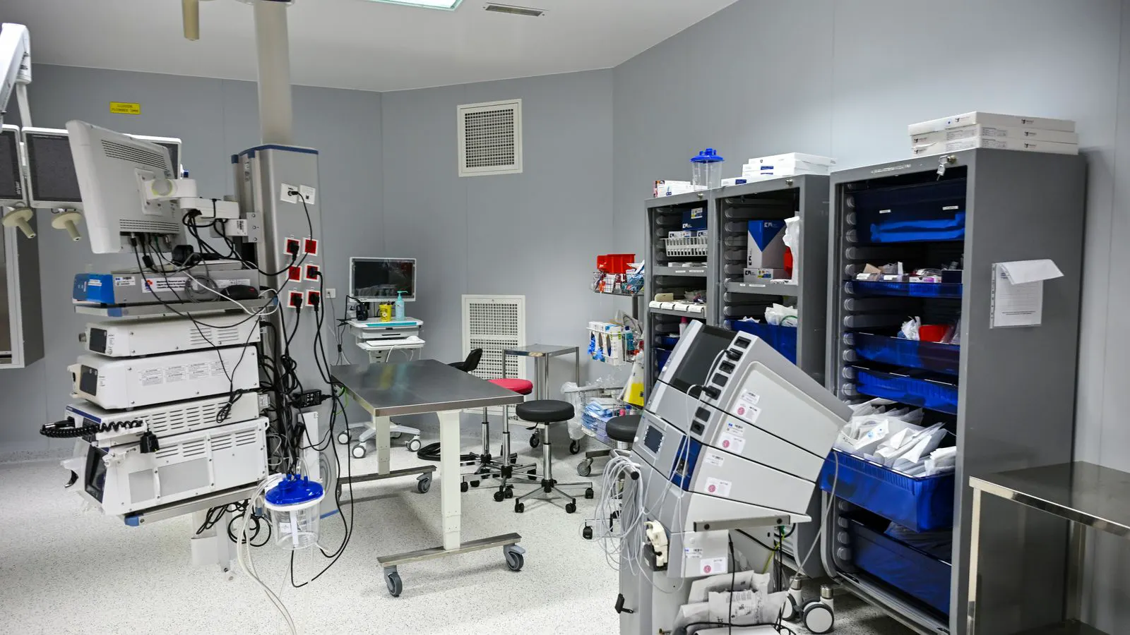 A clean laboratory bench holding various scientific instruments and glassware.