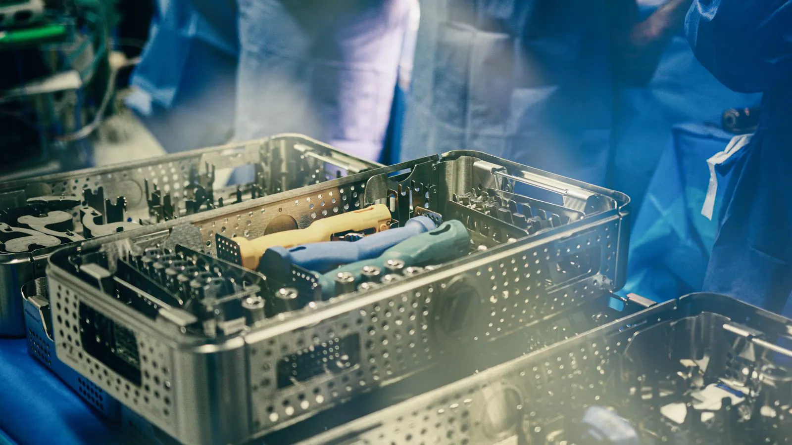 Sealed pouches containing surgical instruments on a clean workbench