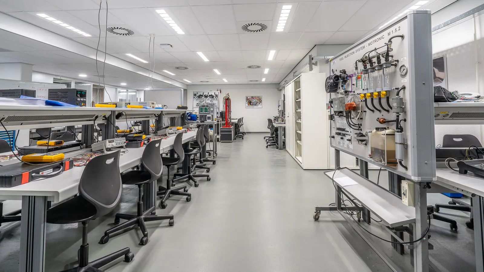 A laboratory room with visible gas lines and instrument prep area
