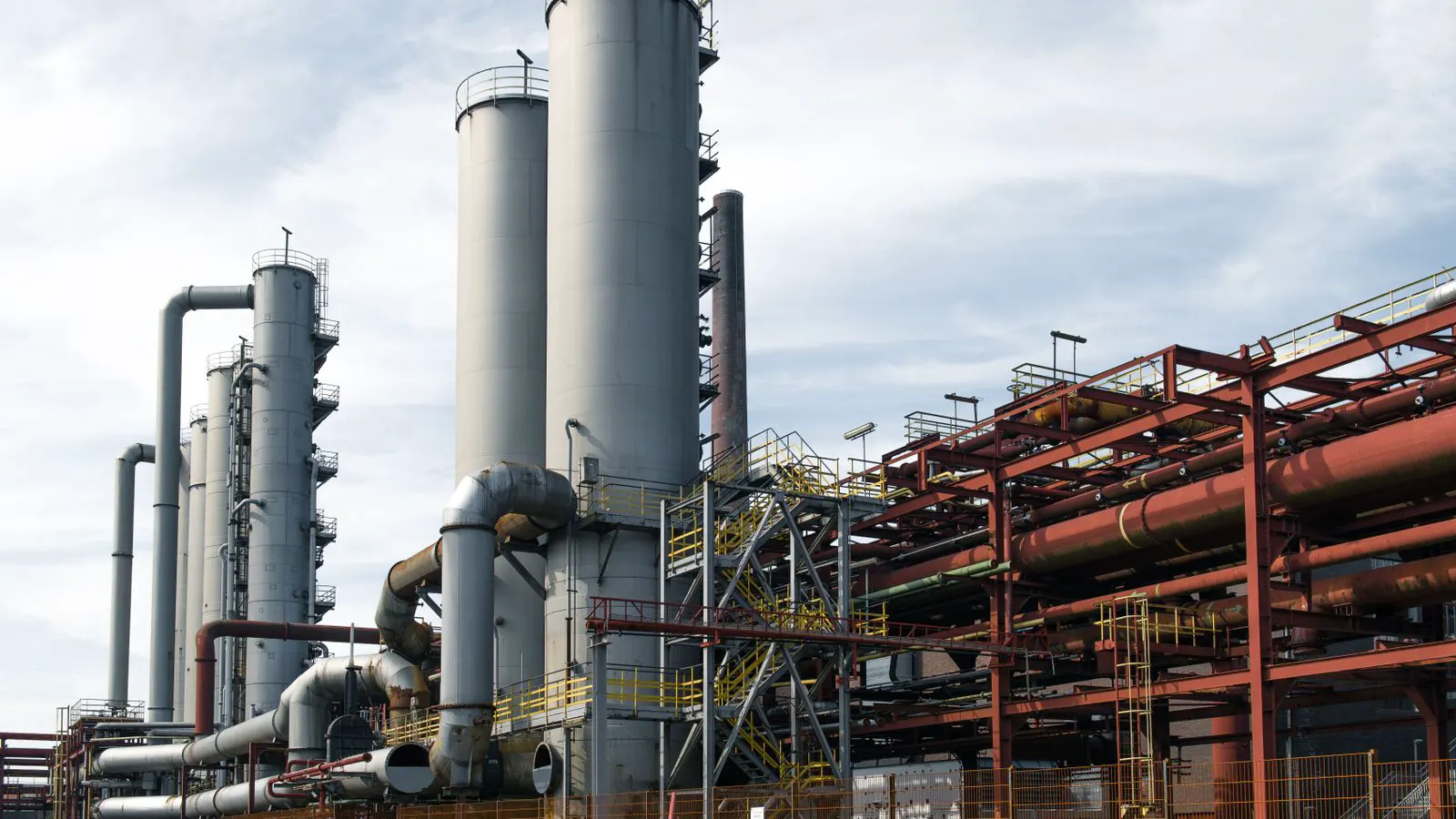 A clean industrial space containing a white oil-free screw compressor unit.