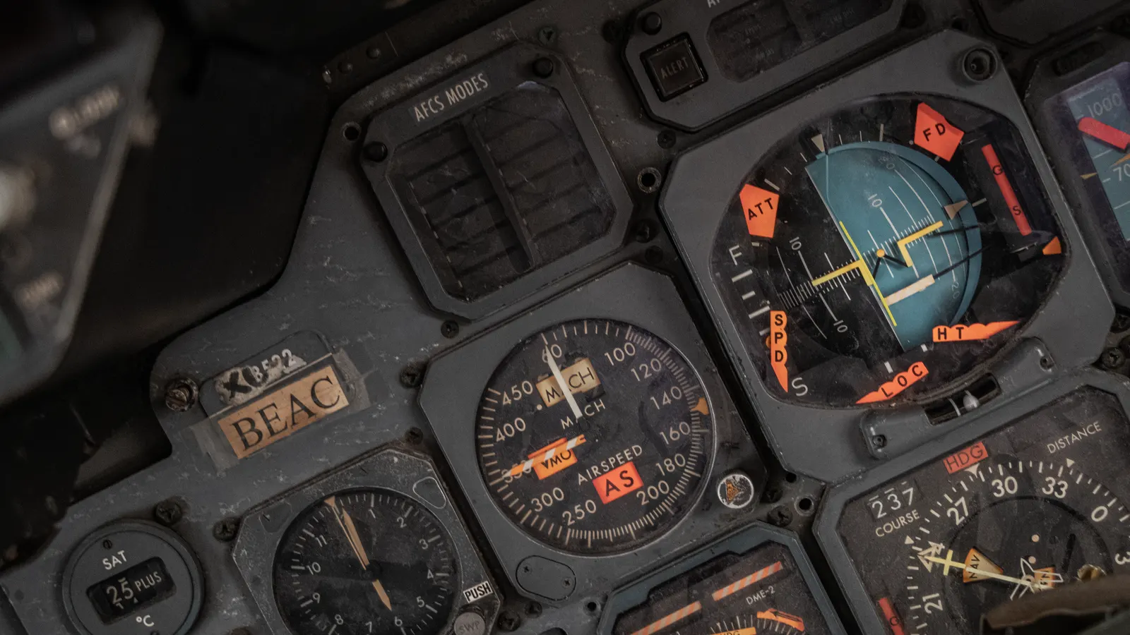 A close-up view of an industrial air dryer control panel with digital displays