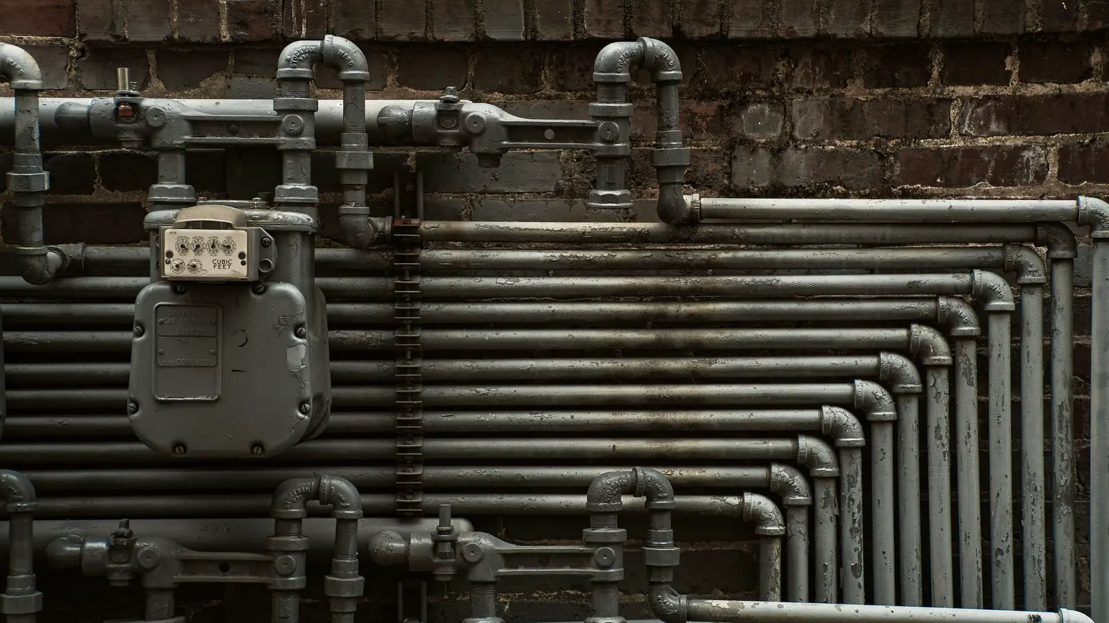 A digital flow meter attached to the discharge line of an oil-free compressor