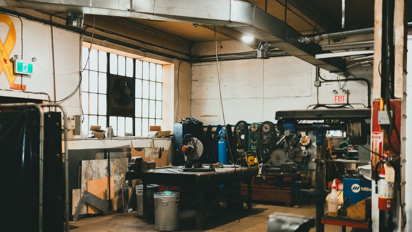 A clean industrial oil-free compressor unit in a workshop