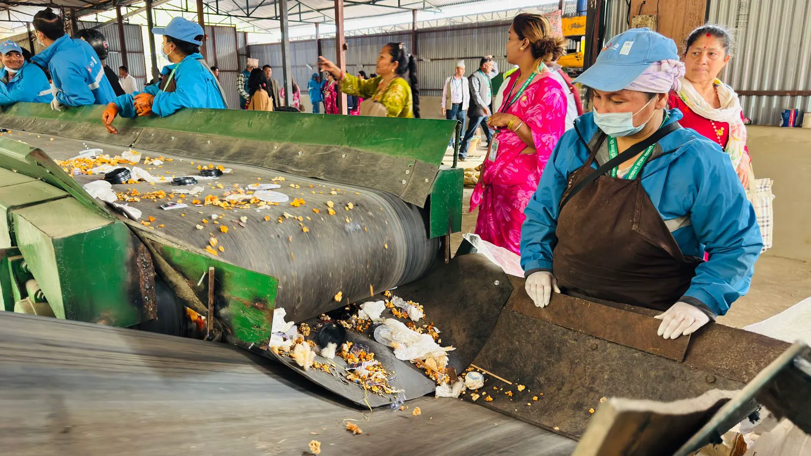 Engineer reviewing a cost analysis sheet near an extrusion line