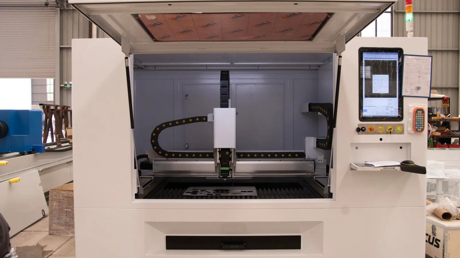 Close up view of an injection molding machine control panel