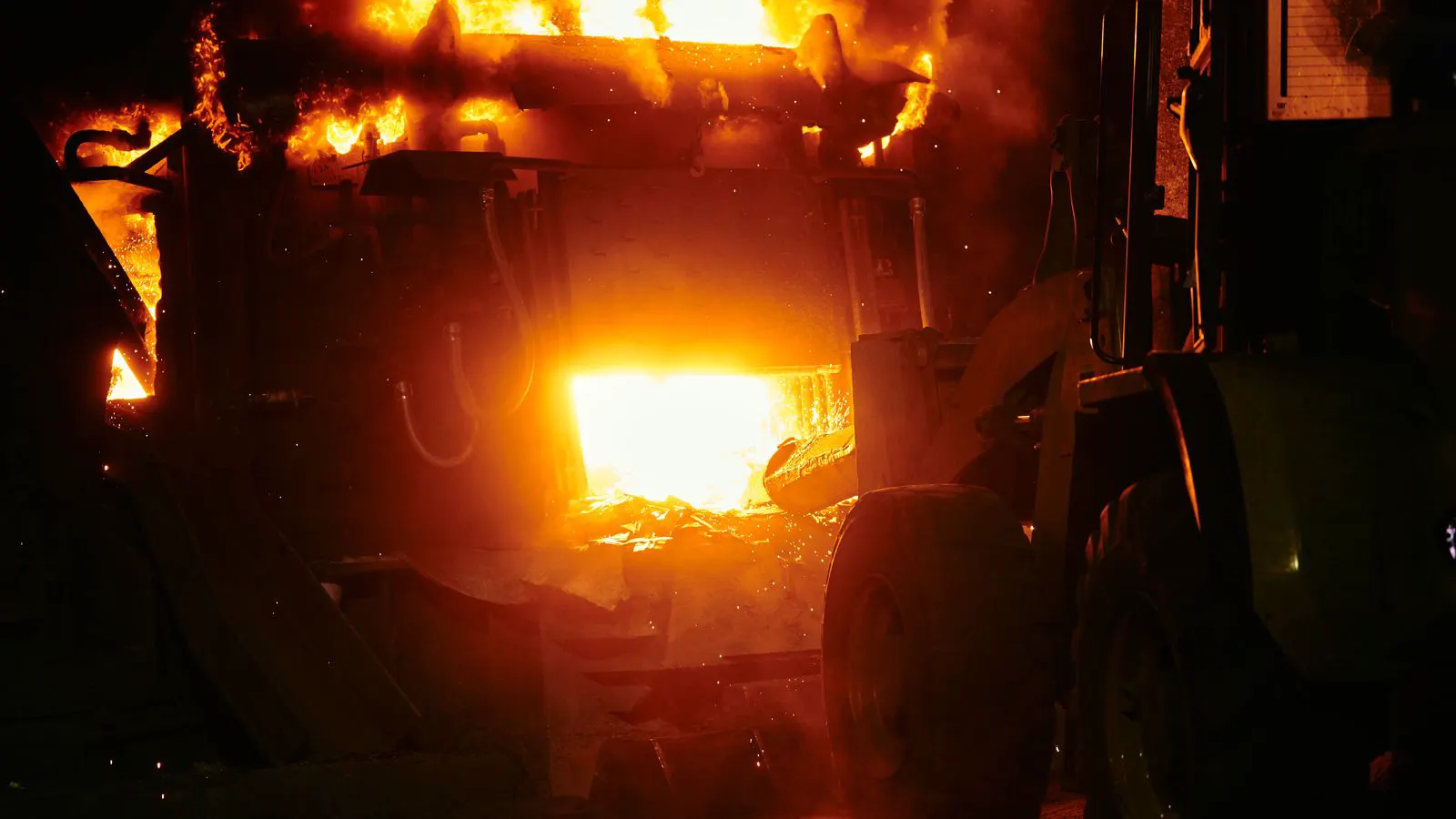 Close-up of a heat exchanger unit inside a plastic factory