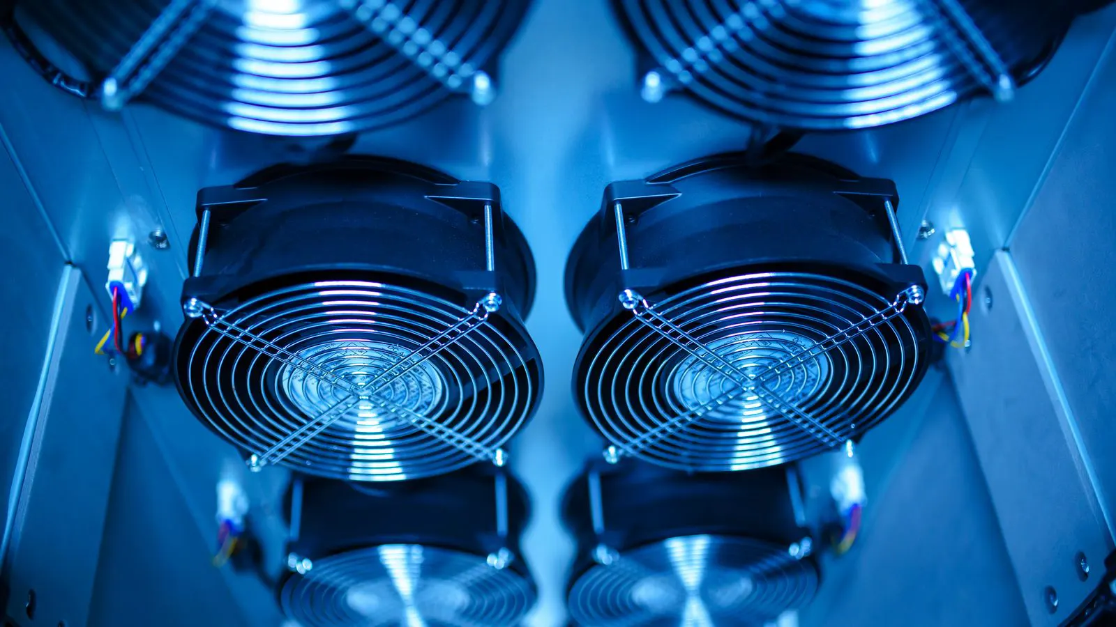 Close view of copper cooling pipes attached to an injection mold.