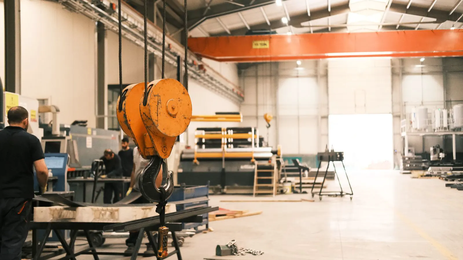 A large baghouse dust collector unit in a workshop setting.