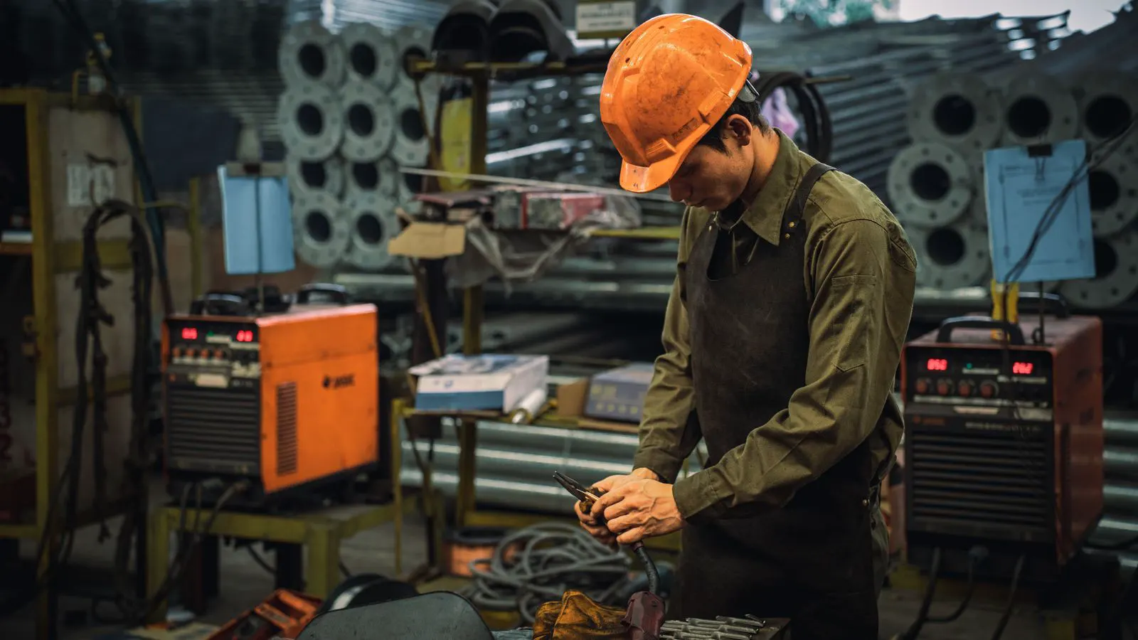 Technician inspecting a safety guard on a woodworking machine