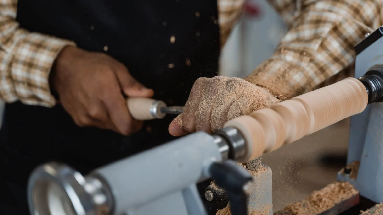 Technician checking spindle alignment on a CNC router