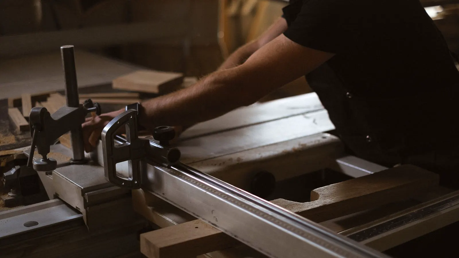 A large industrial panel saw in a clean workshop setting.