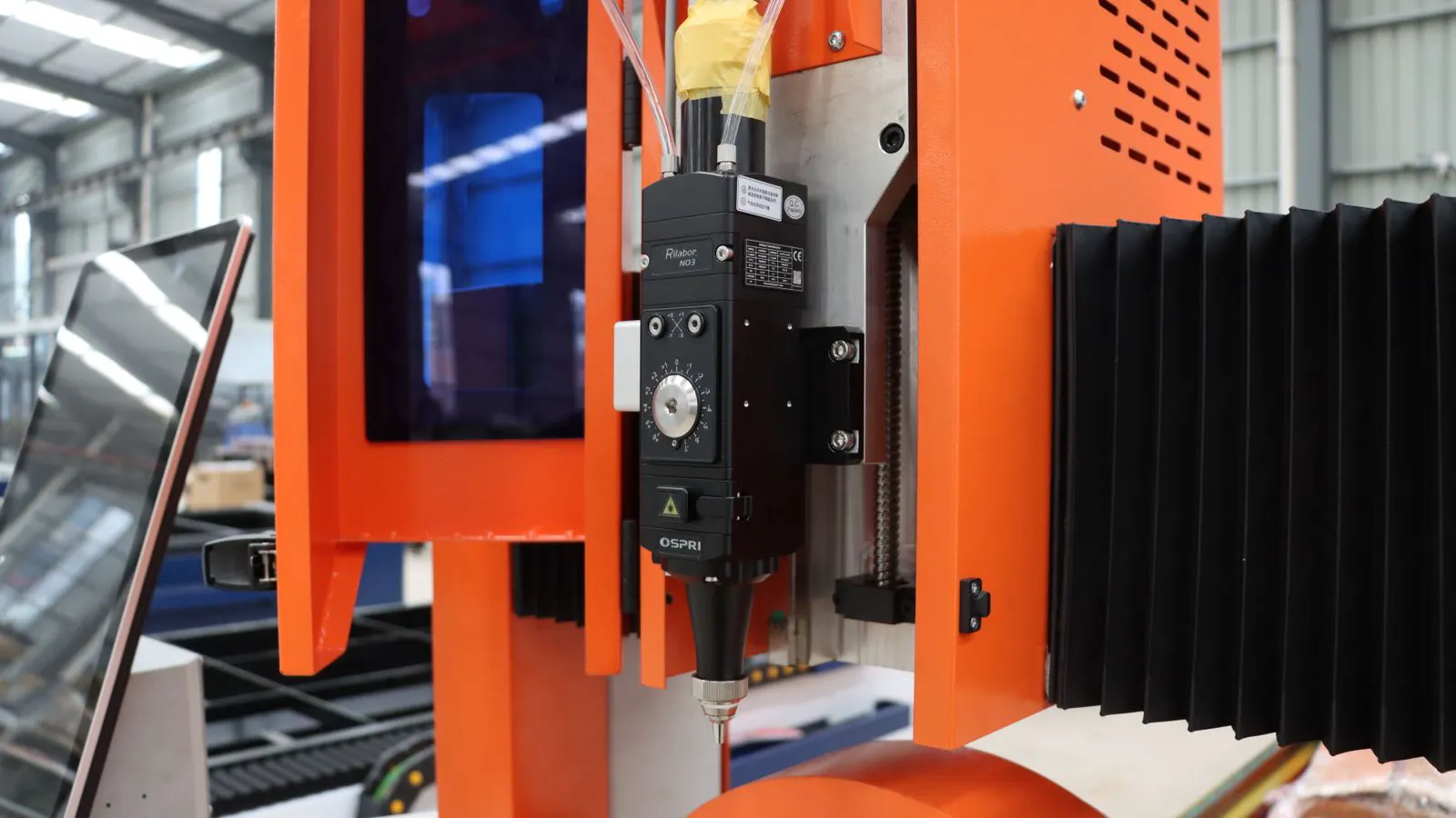 Close view of a CNC mill cutting a metal part