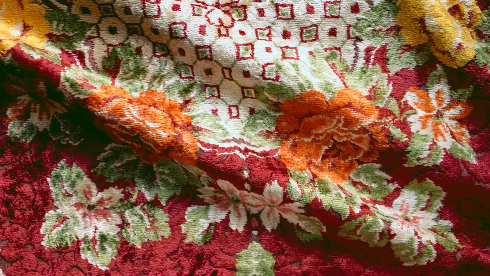 A length of dyed fabric showing distinct color bands
