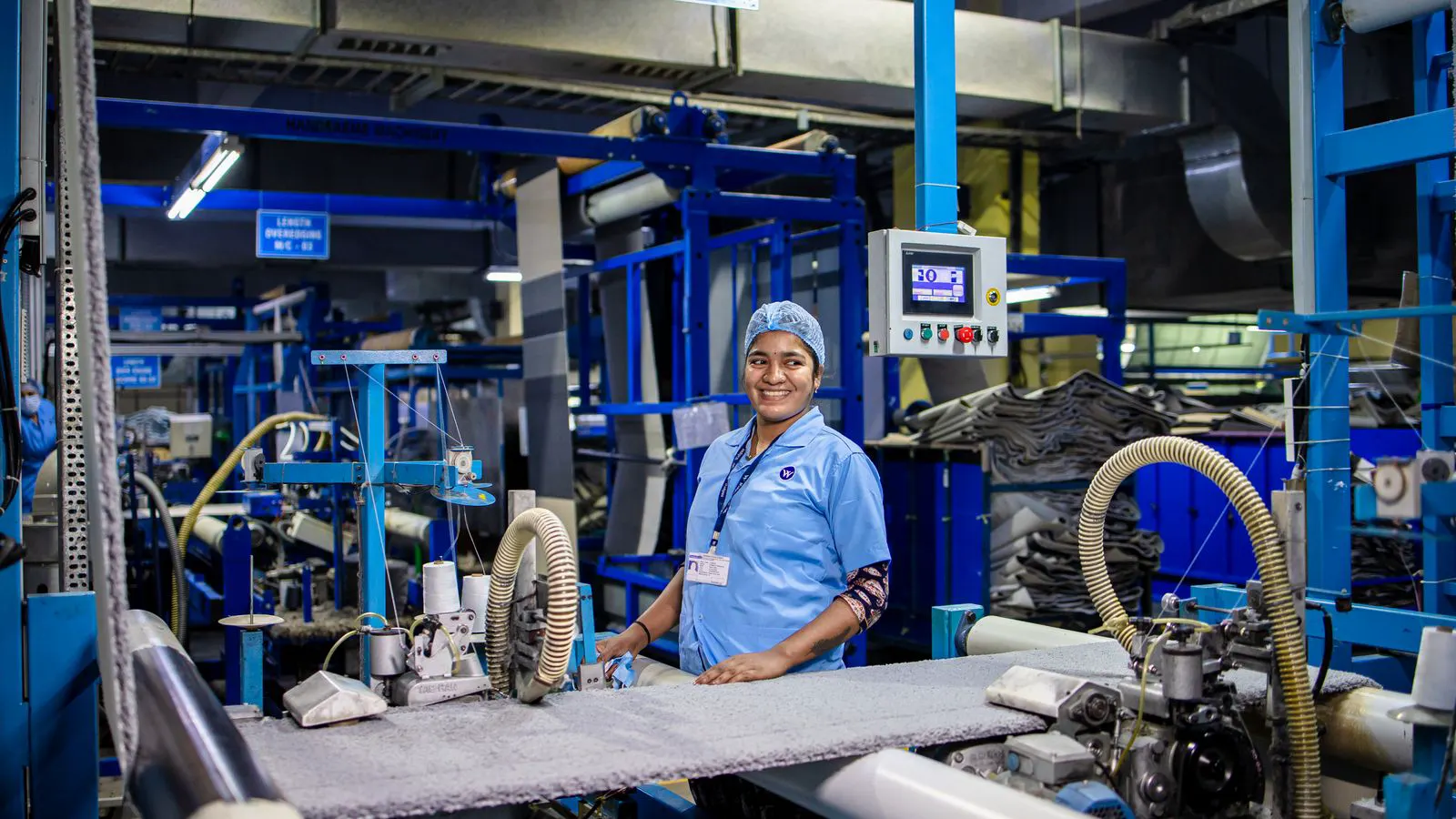 Modular textile machinery arranged in a clean factory floor layout