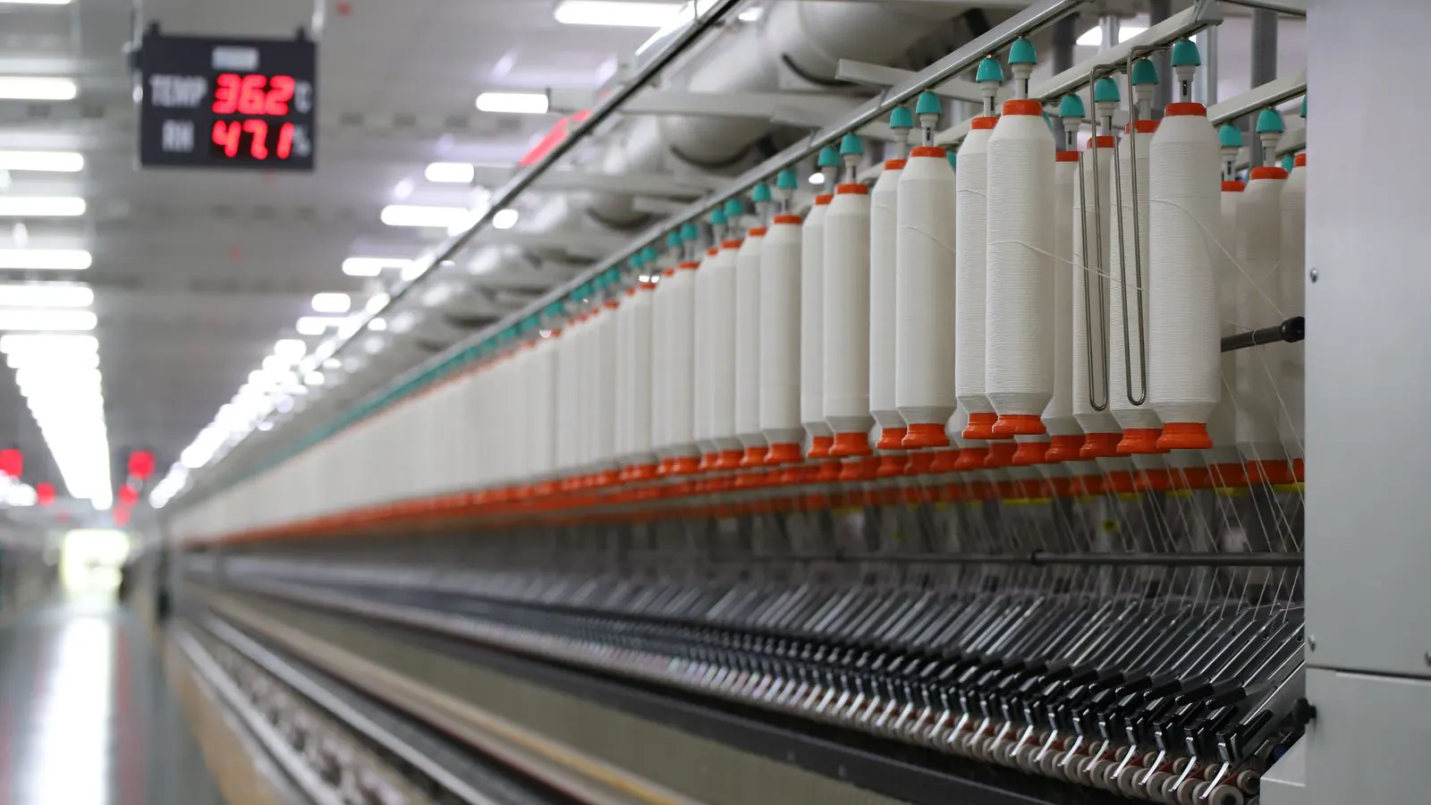 Large weaving loom operating on a factory production line