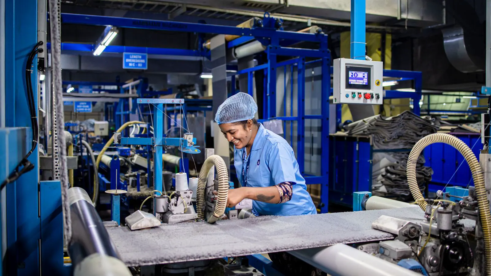 Close up of a modern spinning frame in a textile factory