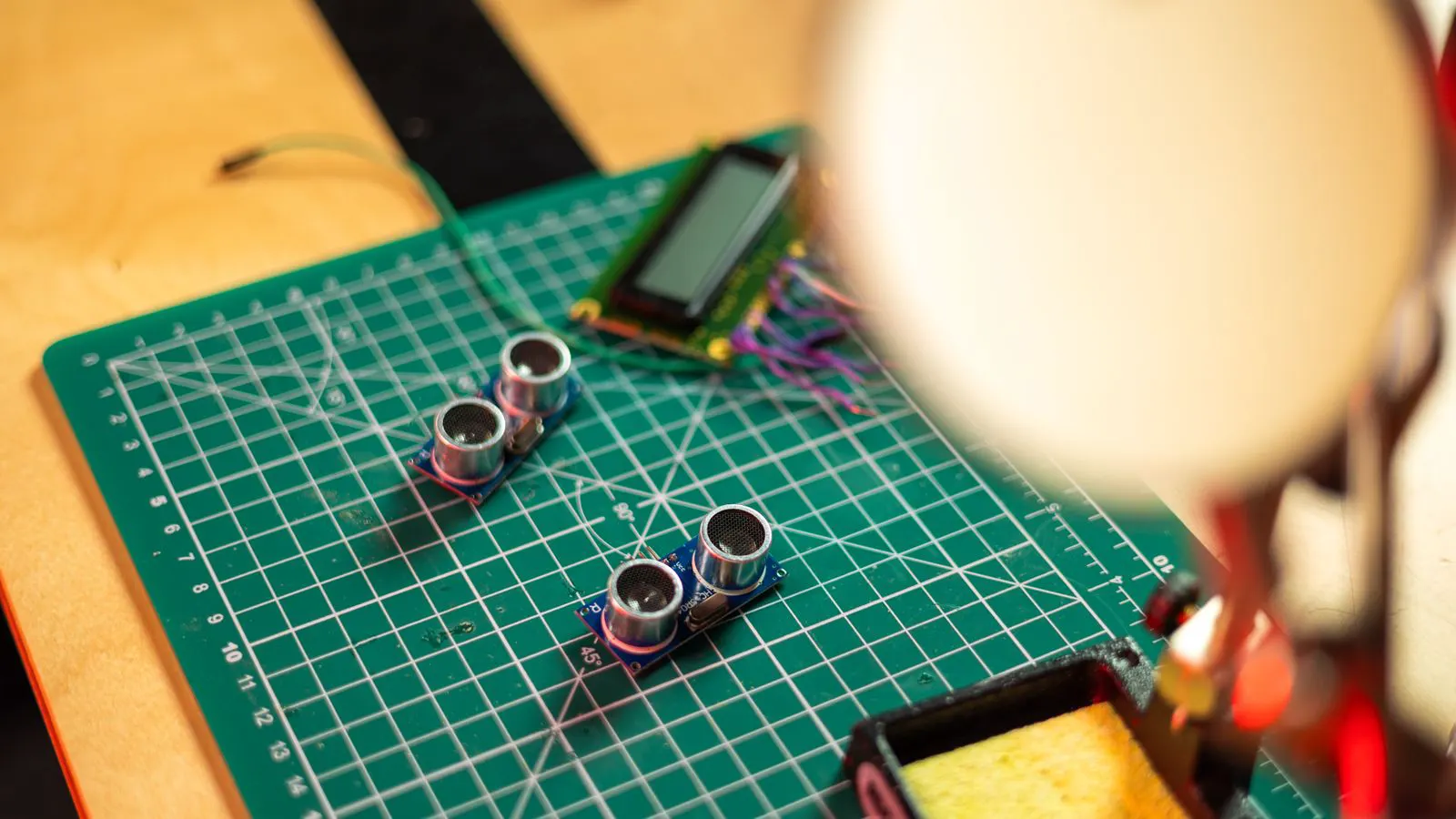 Close up view of an in-mold sensor inside a plastic mold