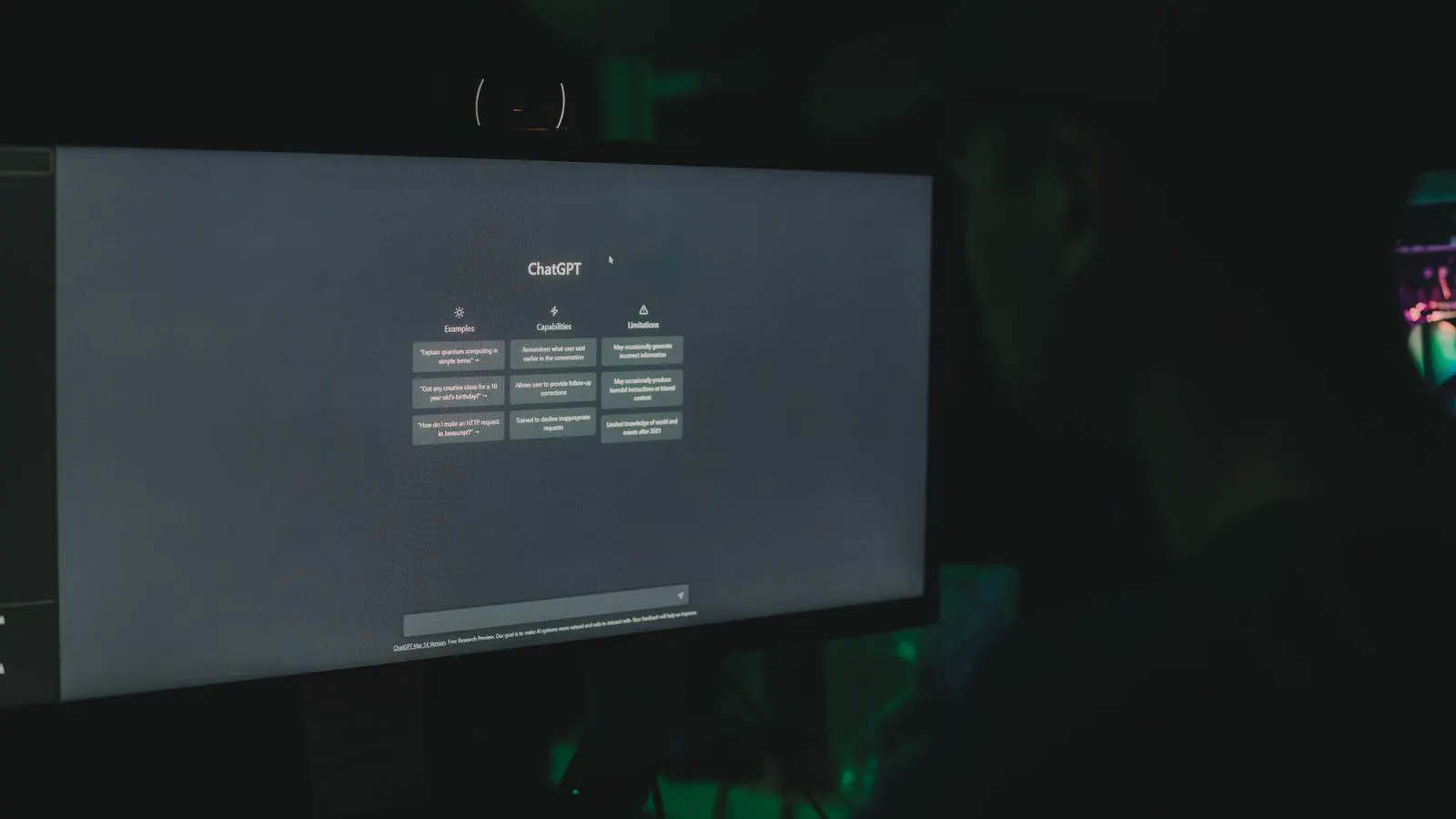 Engineer reviewing a mold flow simulation on a monitor.