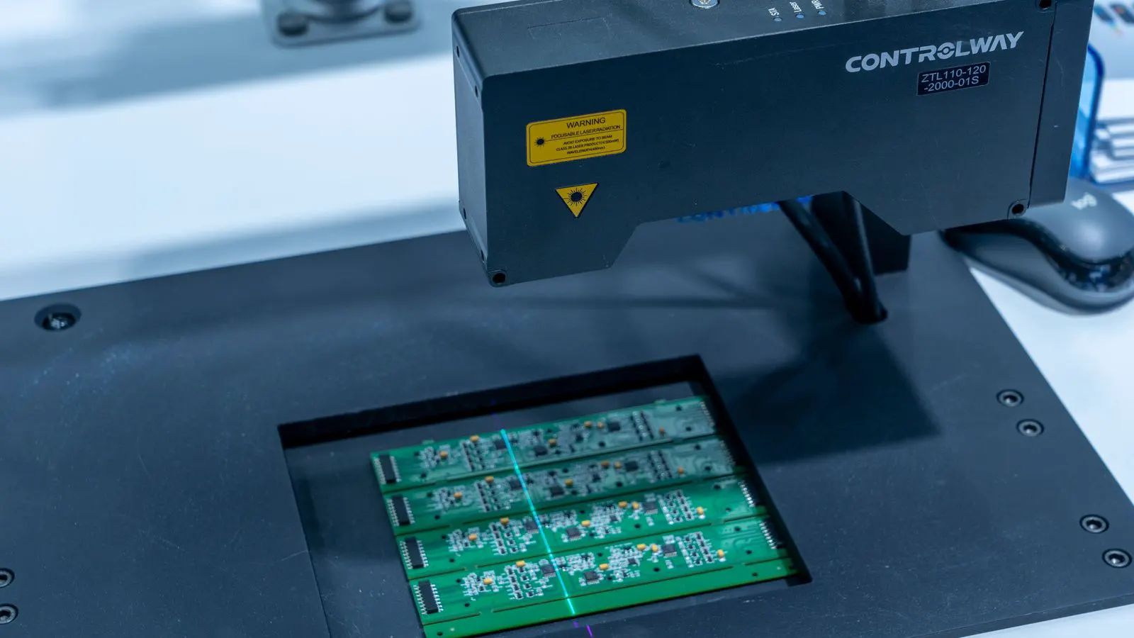 Coordinate measuring machine probe touching a small plastic component