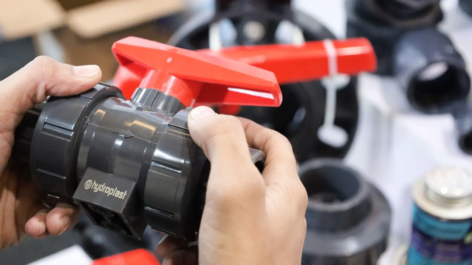 A thin plastic part with visible streaks on the molding line