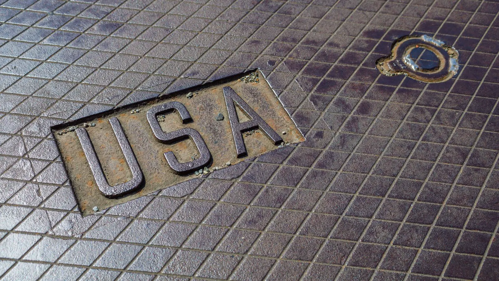 A visible sink mark on a nylon injection molded part surface.
