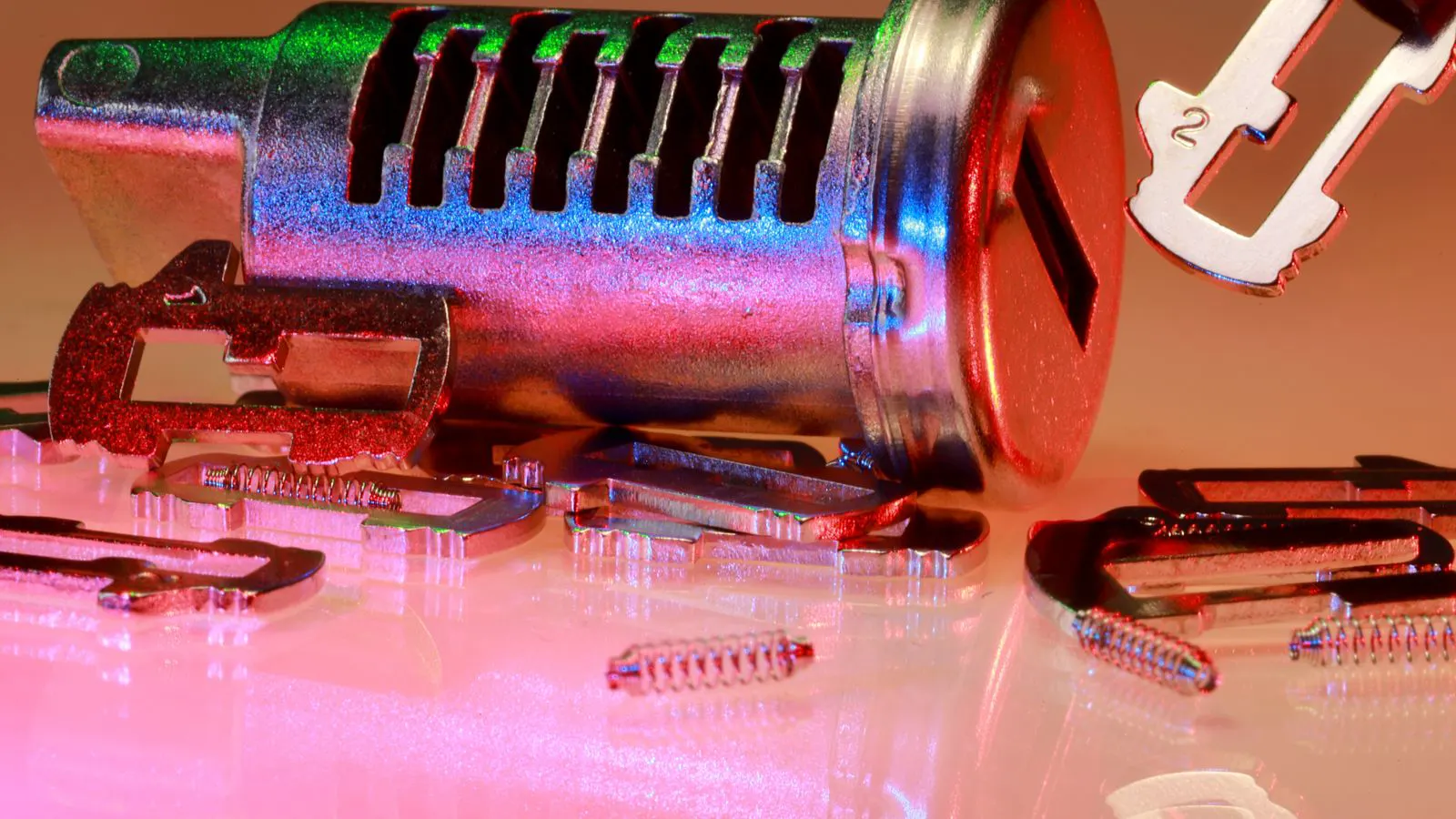 A coordinate measuring machine probes a molded plastic part during dimensional inspection.