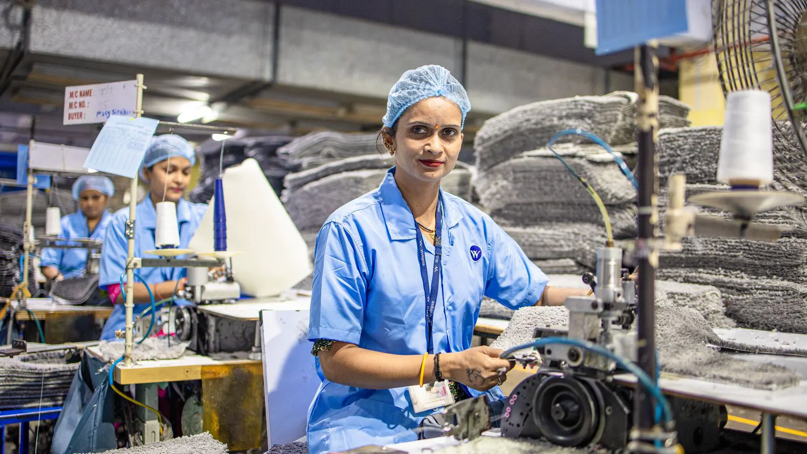 Industrial injection molding machine on a factory floor