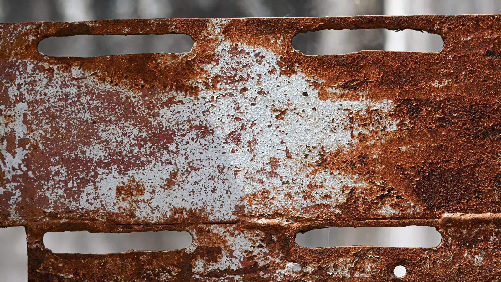 Close up of a carbon steel panel ready for zinc plating