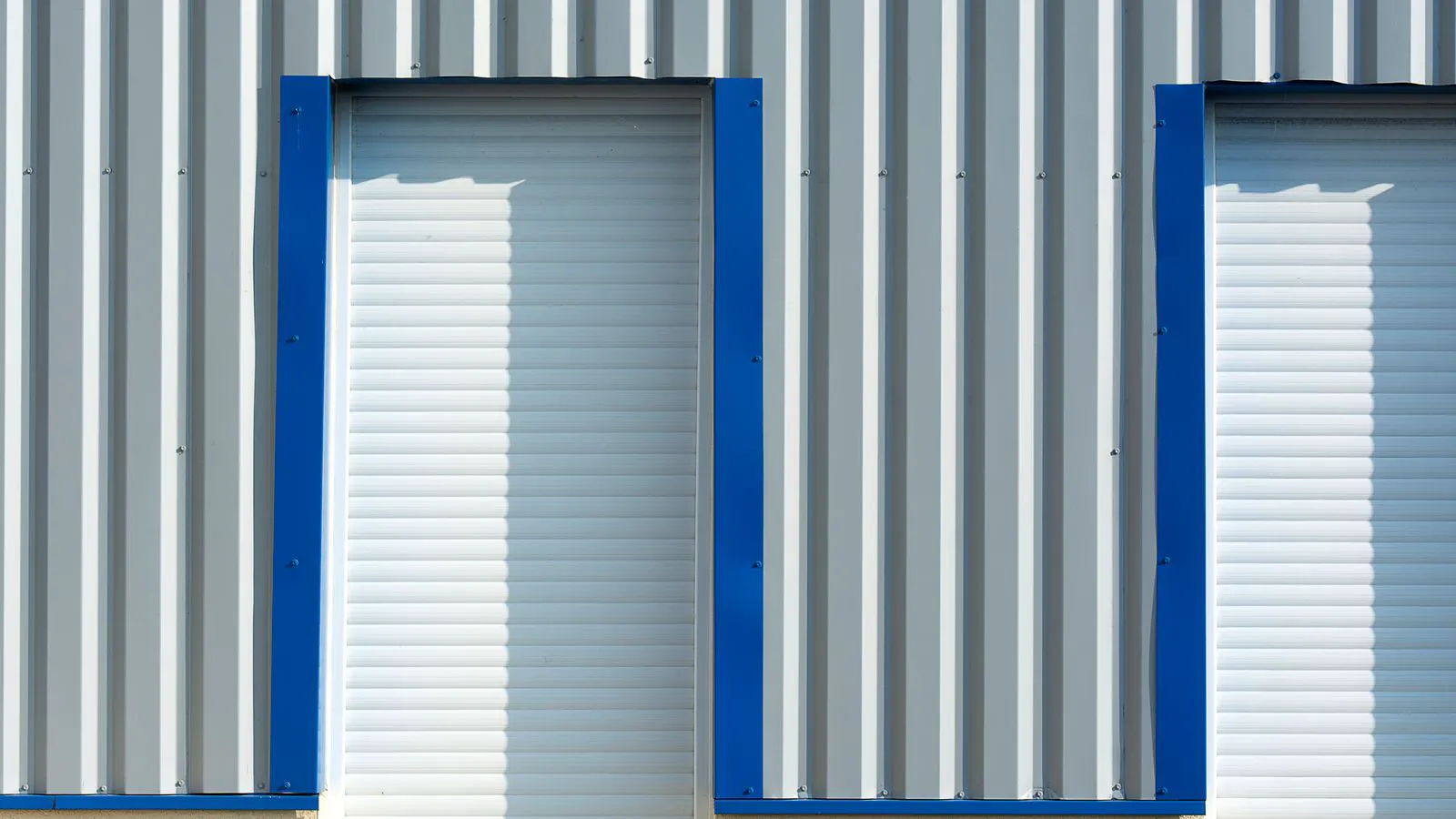 Coiled sheet metal stored in industrial warehouse