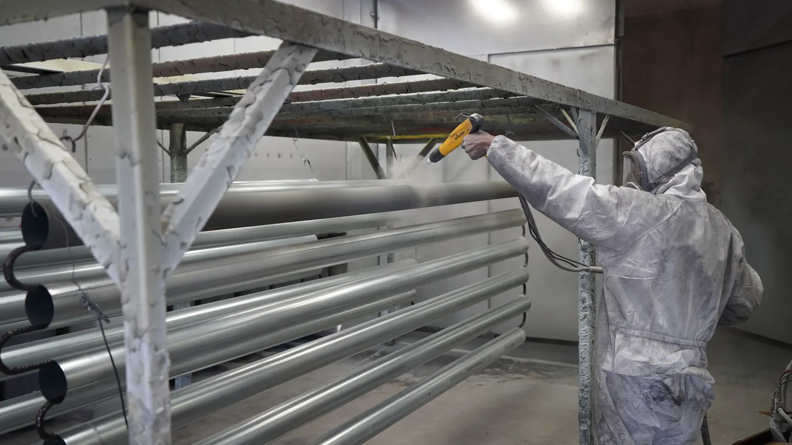 Stainless parts moving through a coating line