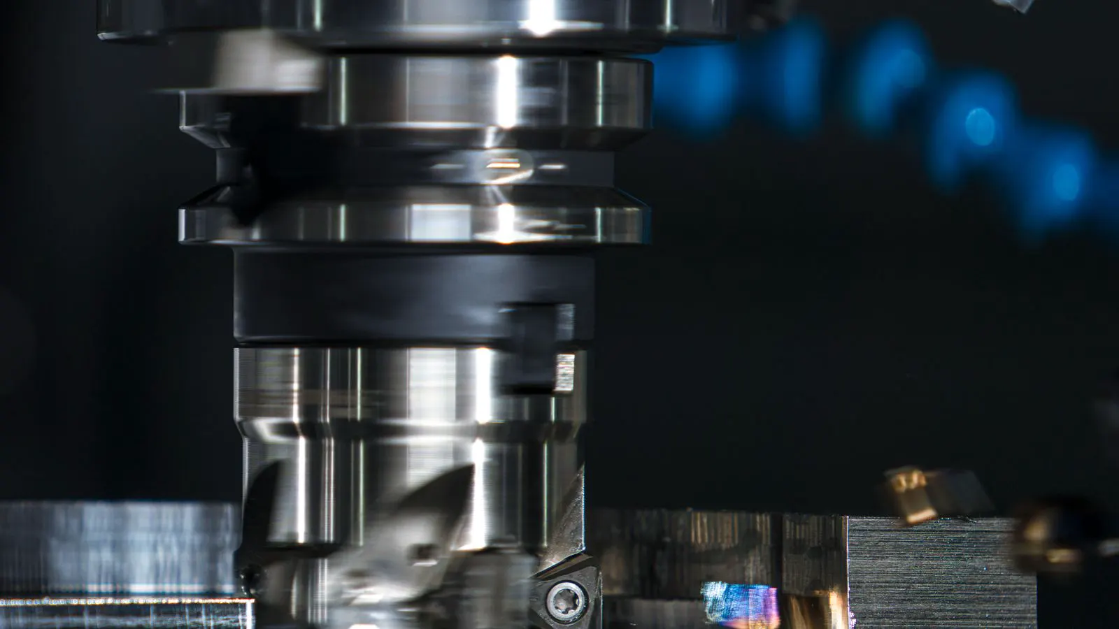Operator setting back gauge on a CNC press brake machine