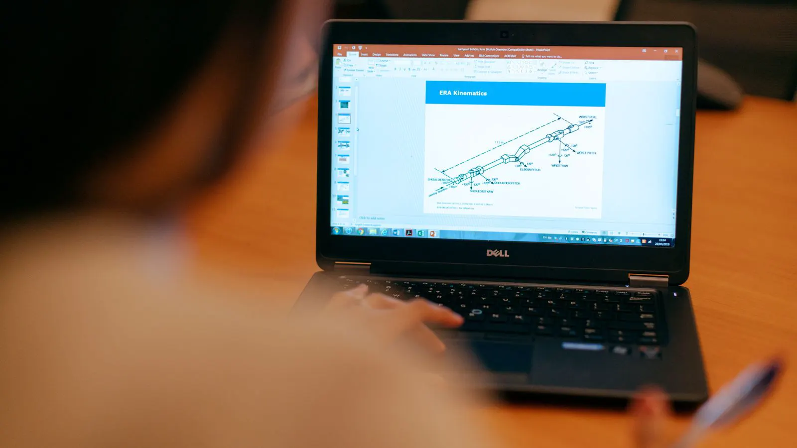 An engineer reviews die casting supplier data on a desktop screen