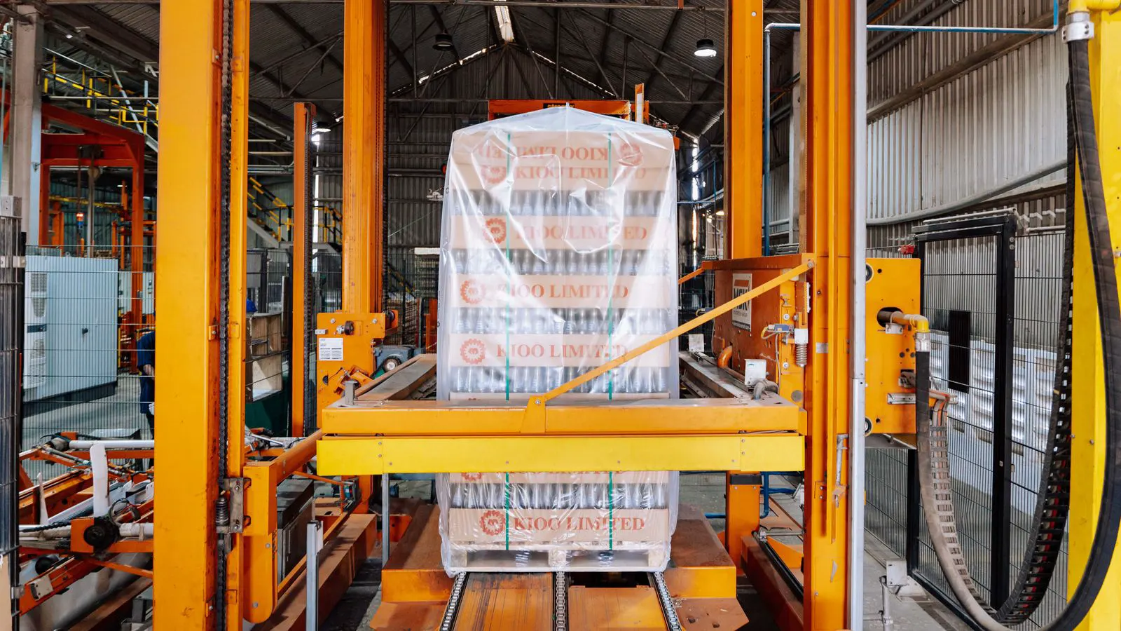 A large aluminum die casting machine in a modern factory setting