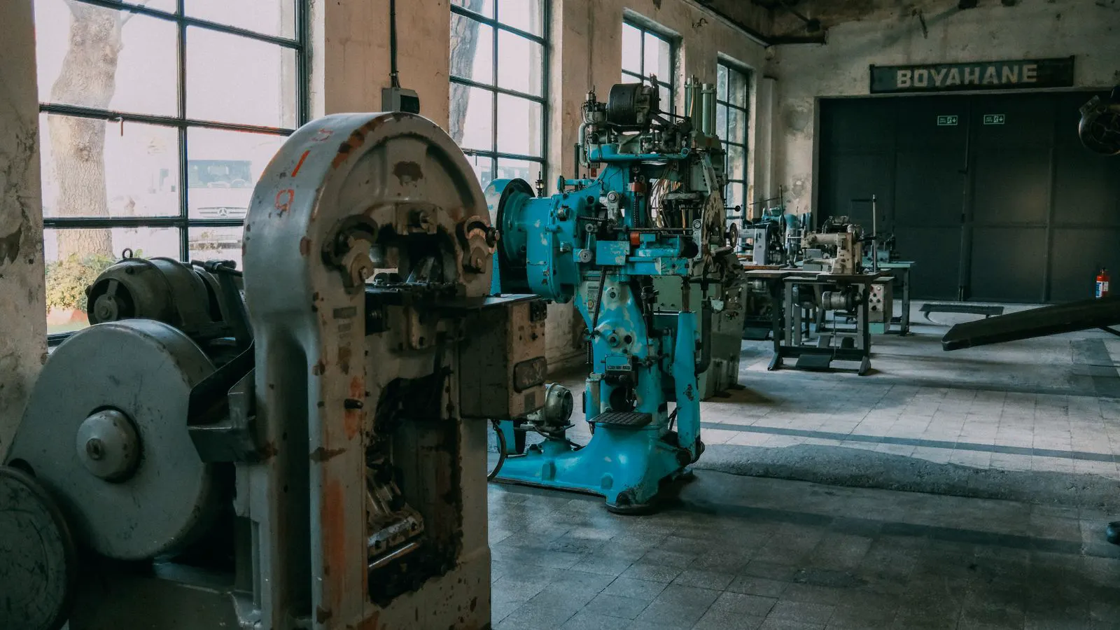 A close up of a magnesium die casting machine in operation