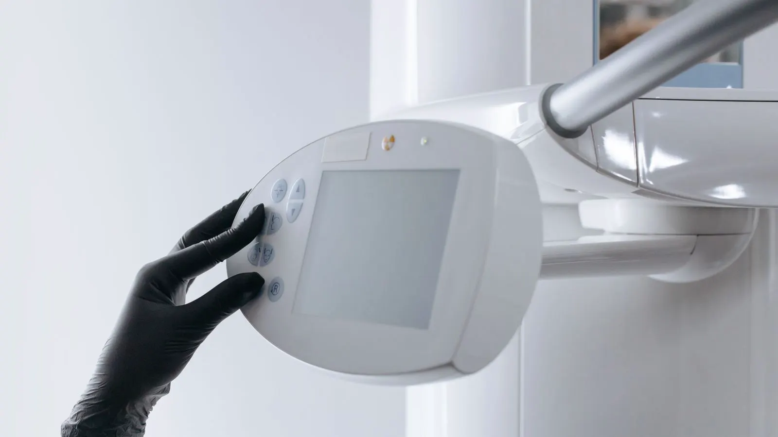 Technician reviewing x ray scan of aluminum casting on a monitor