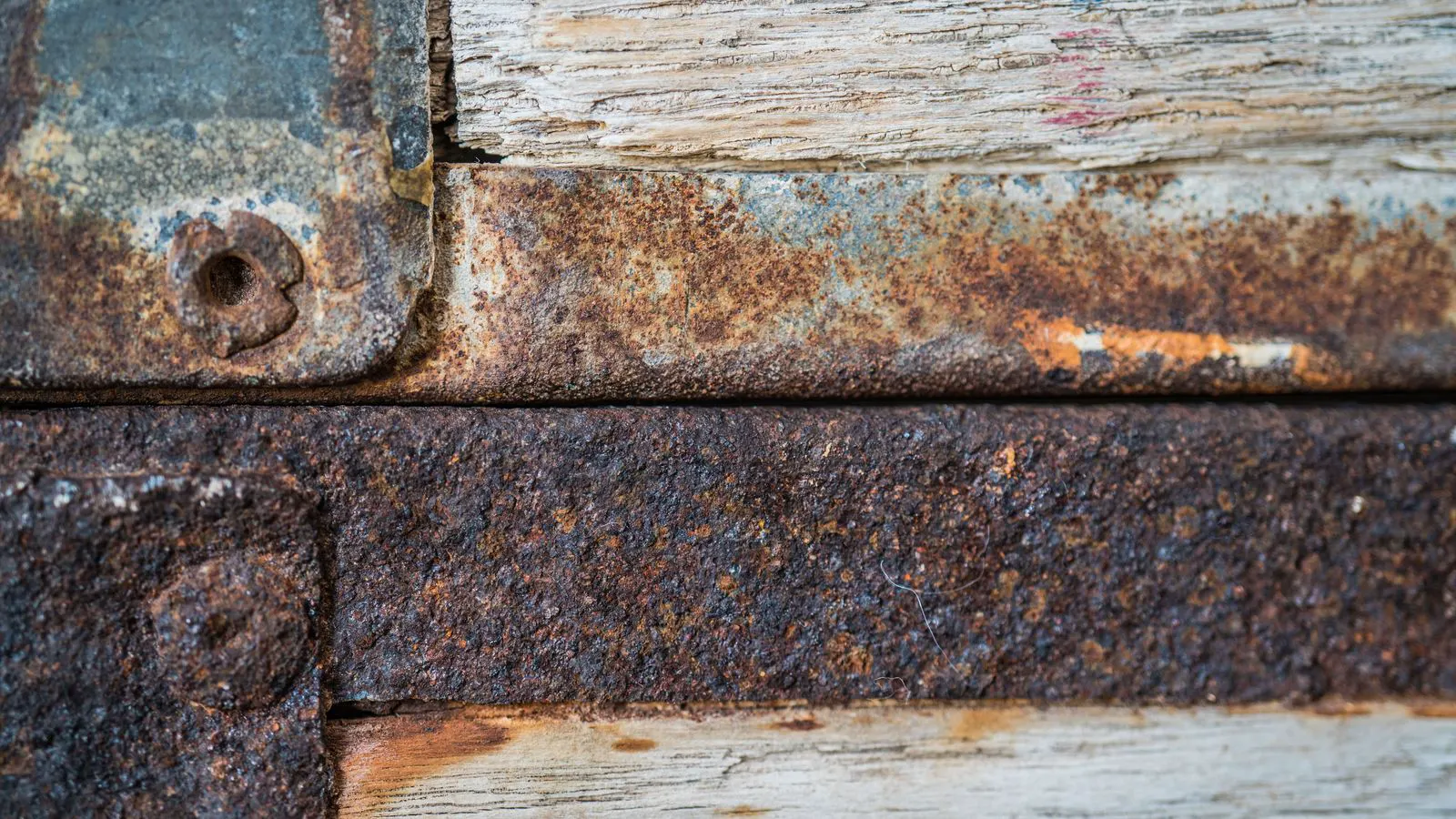 Close-up of a worn die casting mold showing metal wear