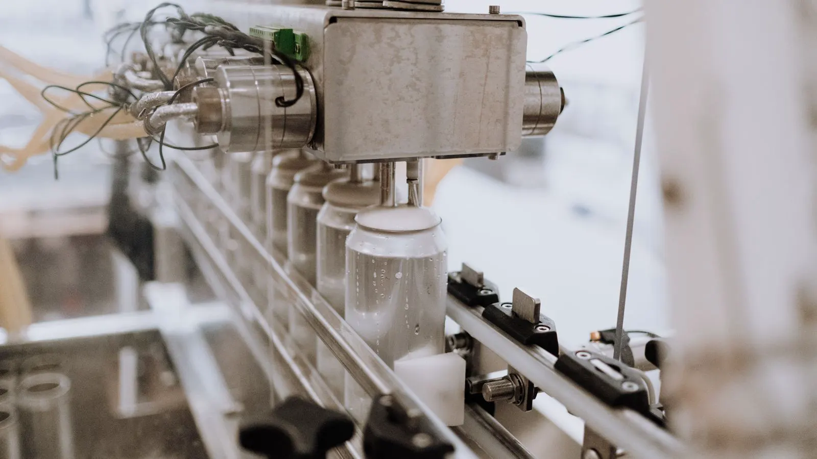 Close view of an aluminum die casting machine with a mold assembly in production.