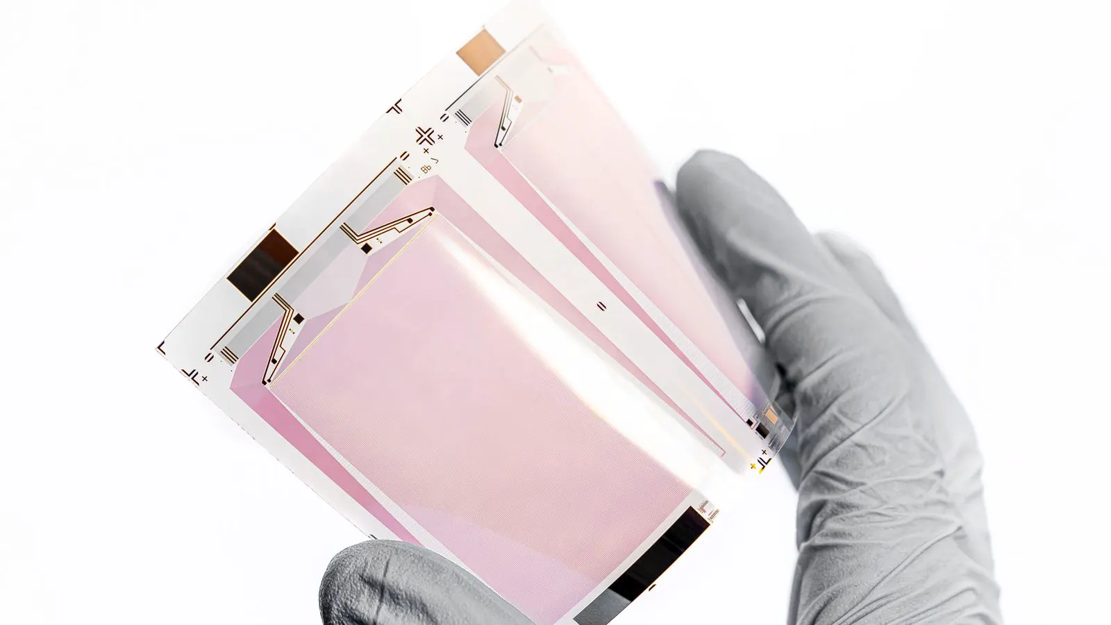 A thin metal sheet part showing a crack near the edge during inspection