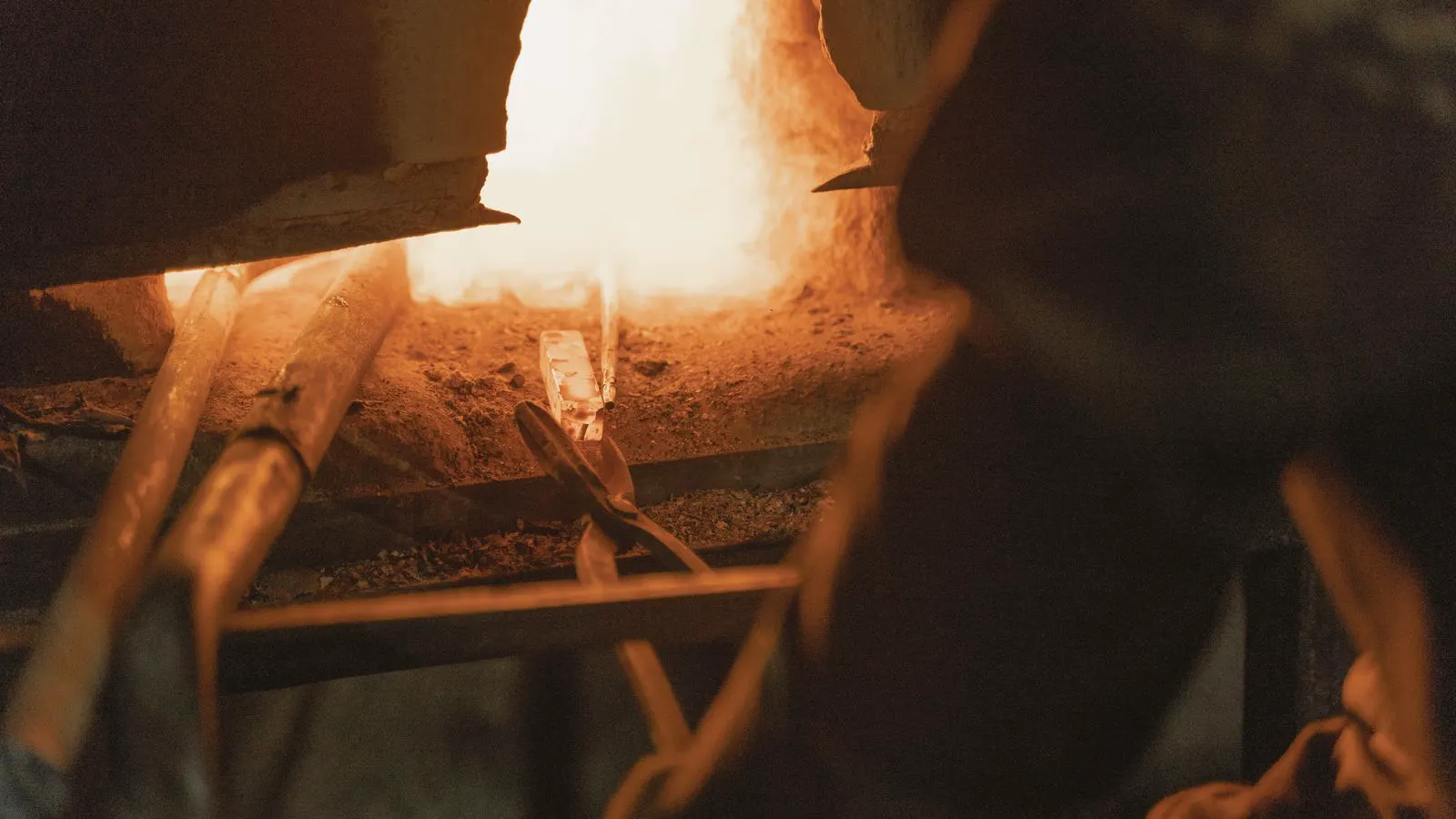 A close-up view of hot forged steel components ready for heat treatment.